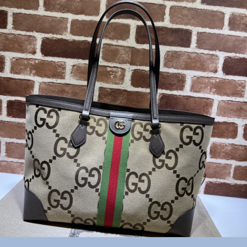 G*u*i shopping bags